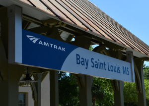 The Bay St. Louis Amtrak stop, located behind the historic L&N Train Depot, has been revitalized with a $270,000 grant from the Federal Railroad Administration. These enhancements (platform canopy extensions and upgraded passenger amenities) prepare the station for the anticipated launch of Amtrak’s Mardi Gras Service in July 2025, restoring passenger rail connectivity along the Gulf Coast for the first time since Hurricane Katrina.
