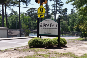 A sign marks the headquarters of Pine Belt Mental Healthcare Resources, home to one of Mississippi’s 14 mobile crisis teams. According to the Mississippi Department of Mental Health, teams across the state made 2,711 visits with community members last fiscal year and were deployed 1,430 times in the first half of this fiscal year alone.
