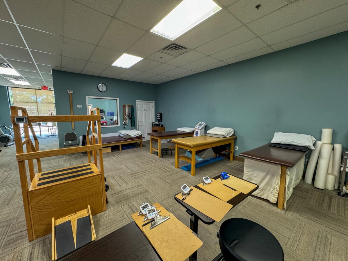 Interior of Encore Rehabilitation in Long Beach showing treatment tables, step equipment and workstations used in physical therapy.
