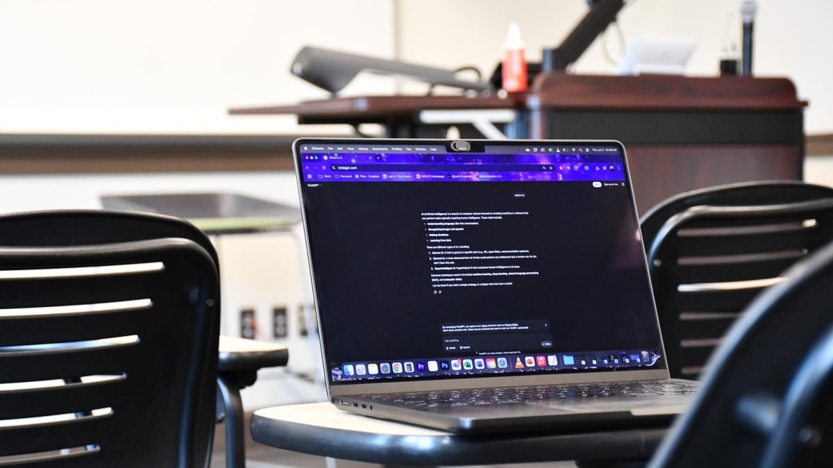Laptop on classroom desk shows the ChatGPT website open on screen at USM’s Hattiesburg campus.