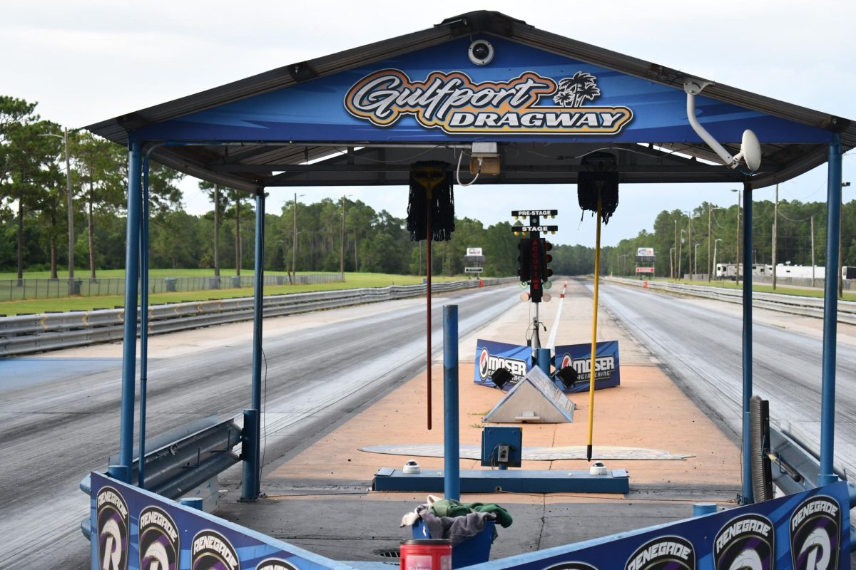 Gulfport Dragway’s starting tent and race lights facing down an empty drag strip.