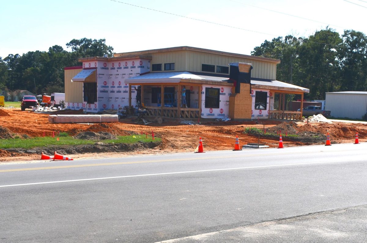 Partially built Jack’s Family Restaurant with construction materials and equipment on site.