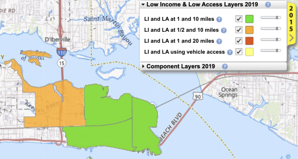 A digital map showing Biloxi, Mississippi, highlights low-income and low-access areas in orange and green. The orange section covers much of East Biloxi, labeled as a food desert. A legend in the top right corner explains the color codes used for the USDA’s low-access layers.