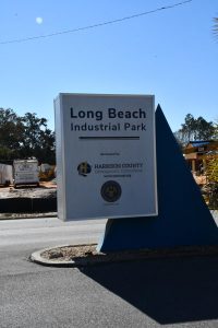 A sign that states “Long Beach Industrial Park.”