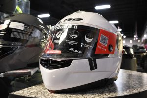 A white motorcycle helmet sits on display at Hattiesburg Cycles.