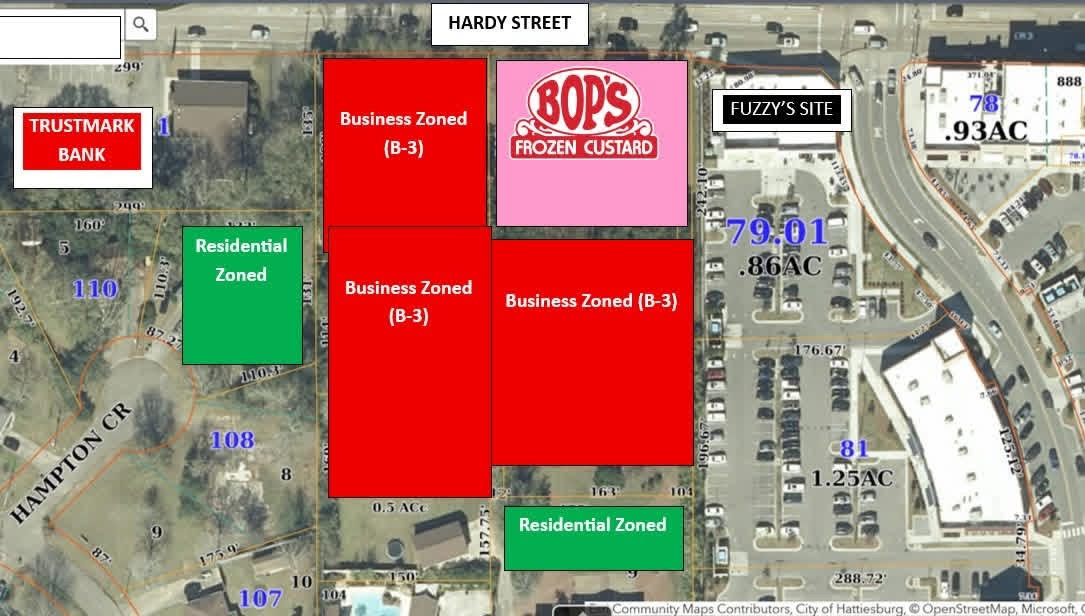 Overhead map of Bop’s Frozen Custard’s development plans, including labels for current business and residential zones, Hardy Street, Trustmark Bank and Fuzzy’s Taco Shop.
