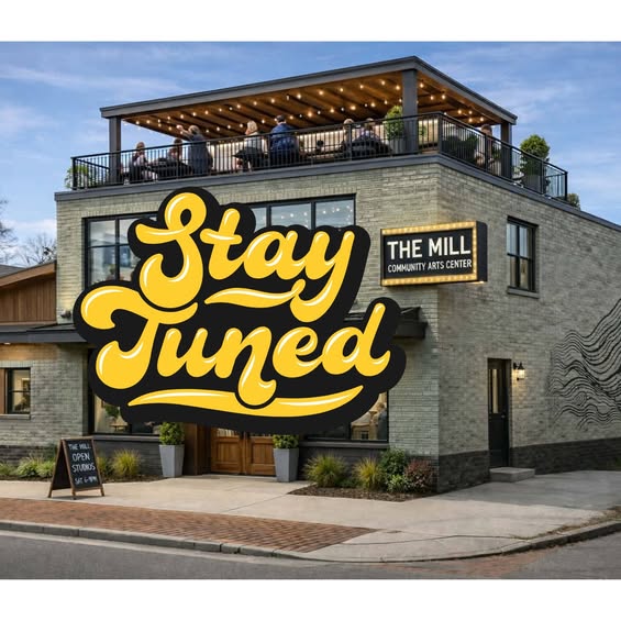 A rendering shows a gray, two-story building with a rooftop patio and a sign reading “The Mill Community Arts Center,” with large yellow “Stay Tuned” text across the front.
